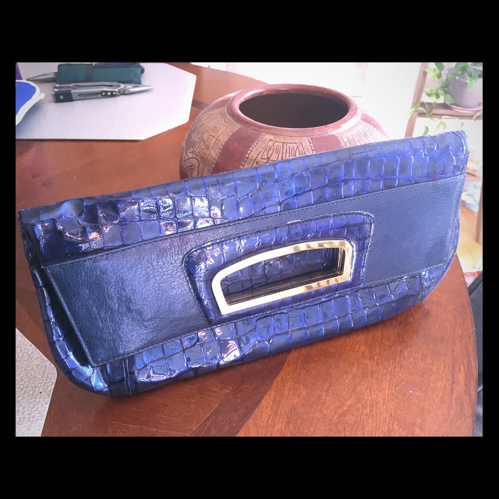 Abas snakeskin leather clutch